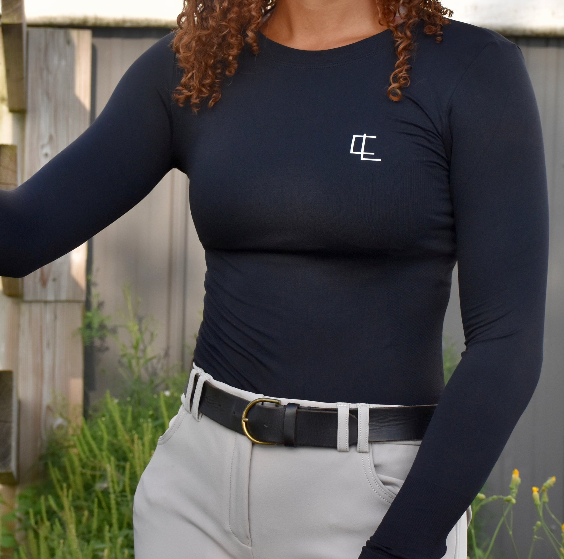 woman in horse riding breeches and Black CL Seamless Baselayer